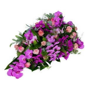Paars / roze rouwarrangement orchidee